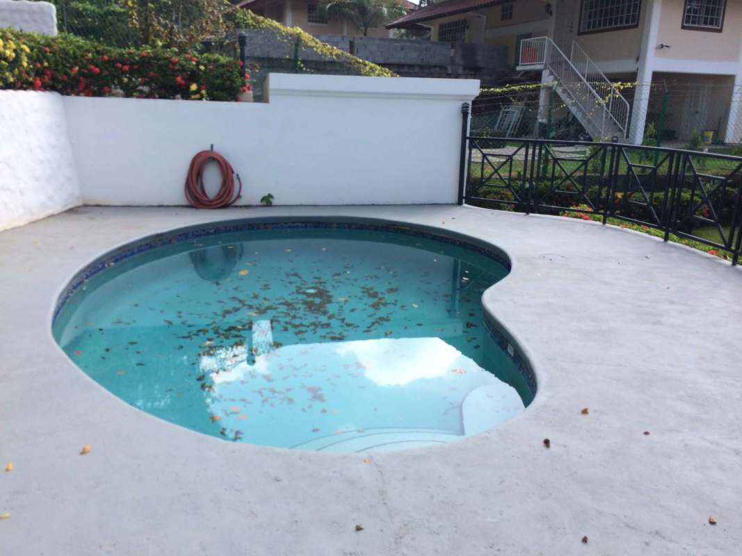 Modern kitchen with granite countertops and wooden cabinets Albrook Panama