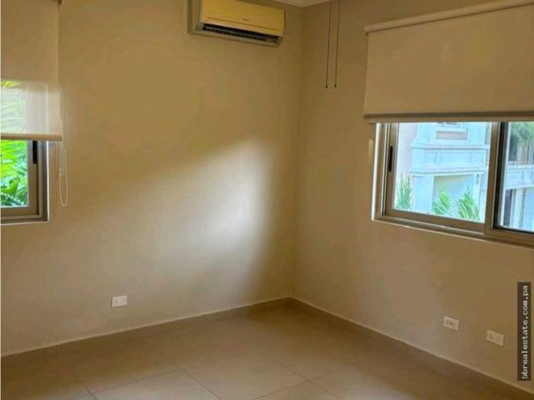 Private green backyard with trees and lawn fenced in PH Embassy Gardens Clayton