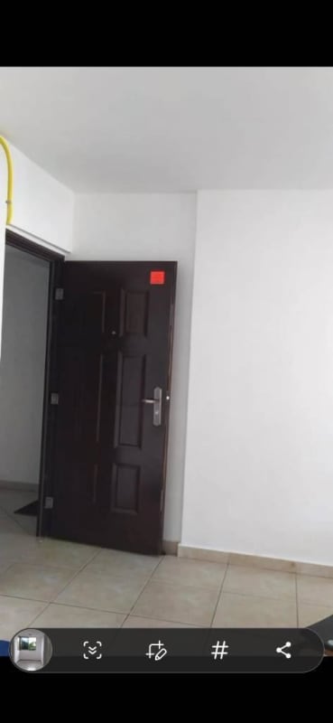 Entry hall with modern tile flooring and solid wood door in PH San Francisco Bay Panama