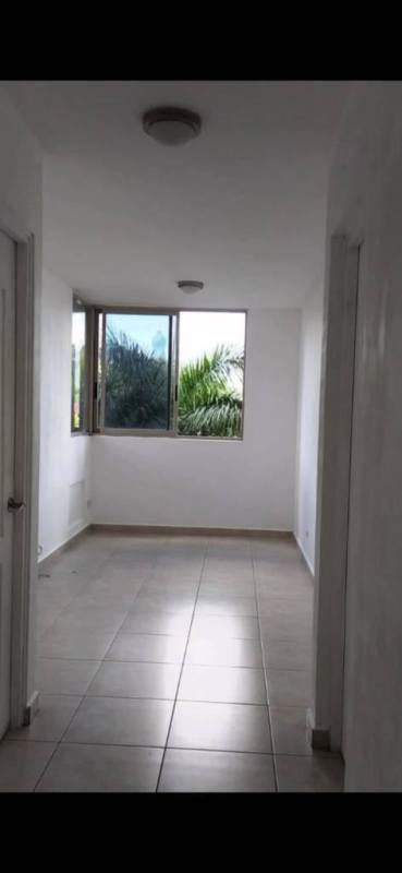 Enclosed panoramic balcony with large corner windows in PH San Francisco Bay Panama City