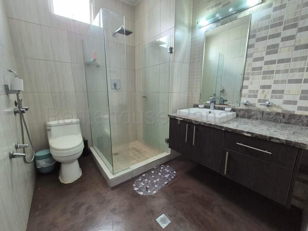 Furnished apartment kitchen with granite countertops and breakfast bar PH El Cangrejo Panama City
