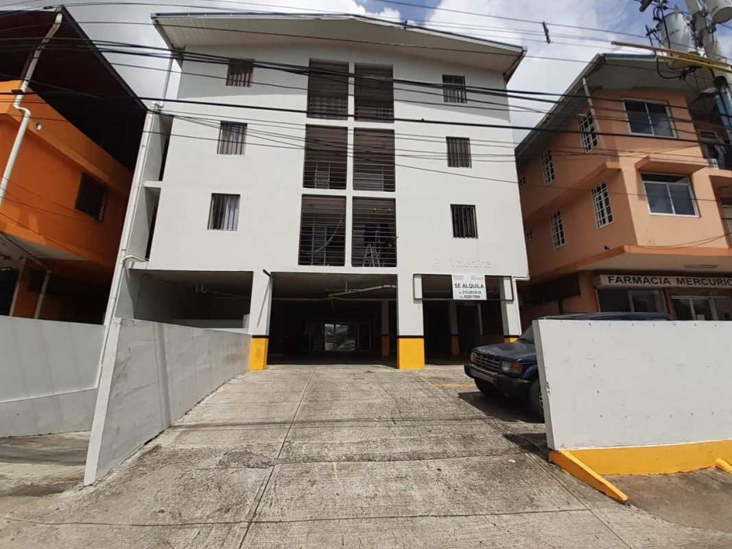 Facade and entrance gate of PH Valentina mid-rise building in El Ingenio Panama City