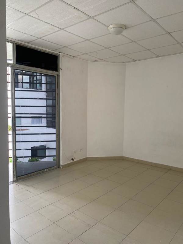 Small apartment balcony with railing, views of Panama City rooftops at PH Valentina