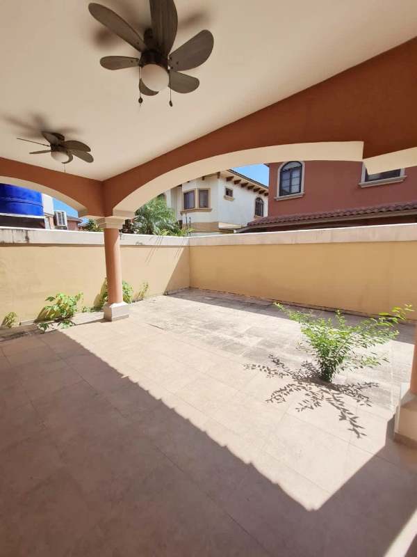 Covered backyard terrace with arches, tiled floor at PH El Doral Costa Sur Panama