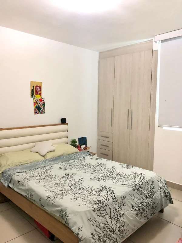 Bedroom featuring wardrobe, minimalistic decor and large windows PH Kings Park Tower 400