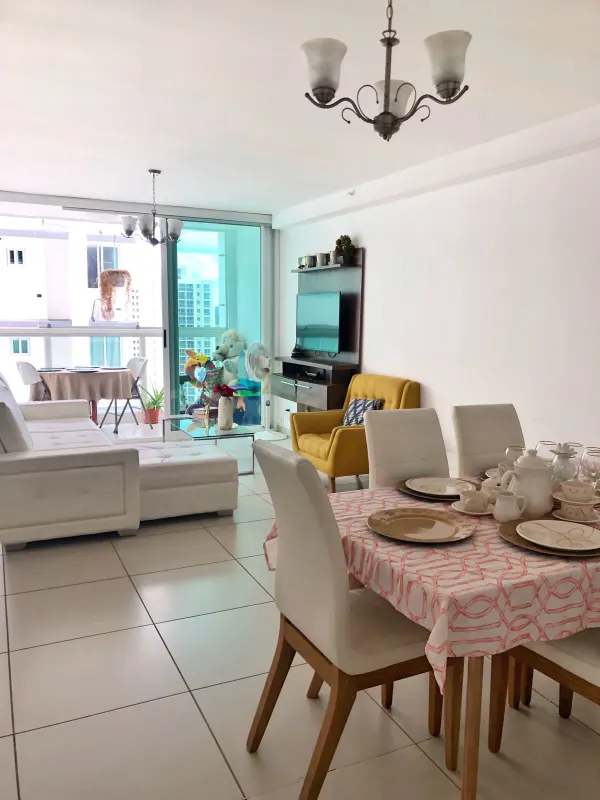 Open concept living dining room with balcony access condo apartment in Kings Park Condado del Rey