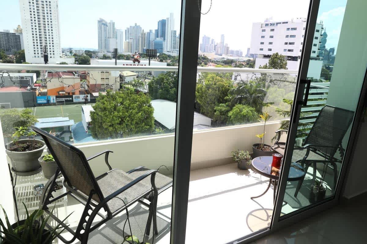 Modern indoor gym with equipment and natural light at PH Quartz Tower San Francisco Panama