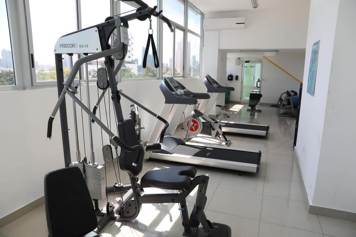 Outdoor pool area with lounge chairs atop PH Quartz Tower San Francisco Panama