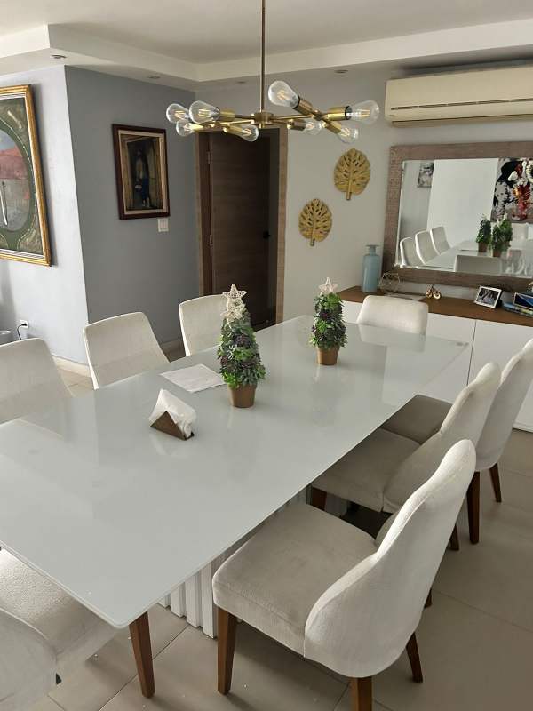 Contemporary dining space with mirror PH Diplomatic apartment Panama
