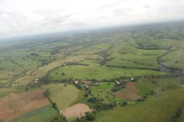 Wide open pasture with hills and natural terrain farmland El Espino Panama