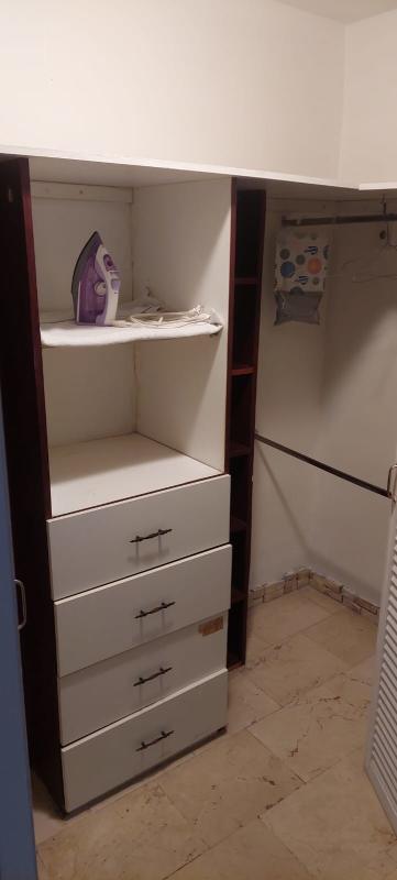 Equipped kitchen with granite counters, washer, dryer in Vista Tower Obarrio