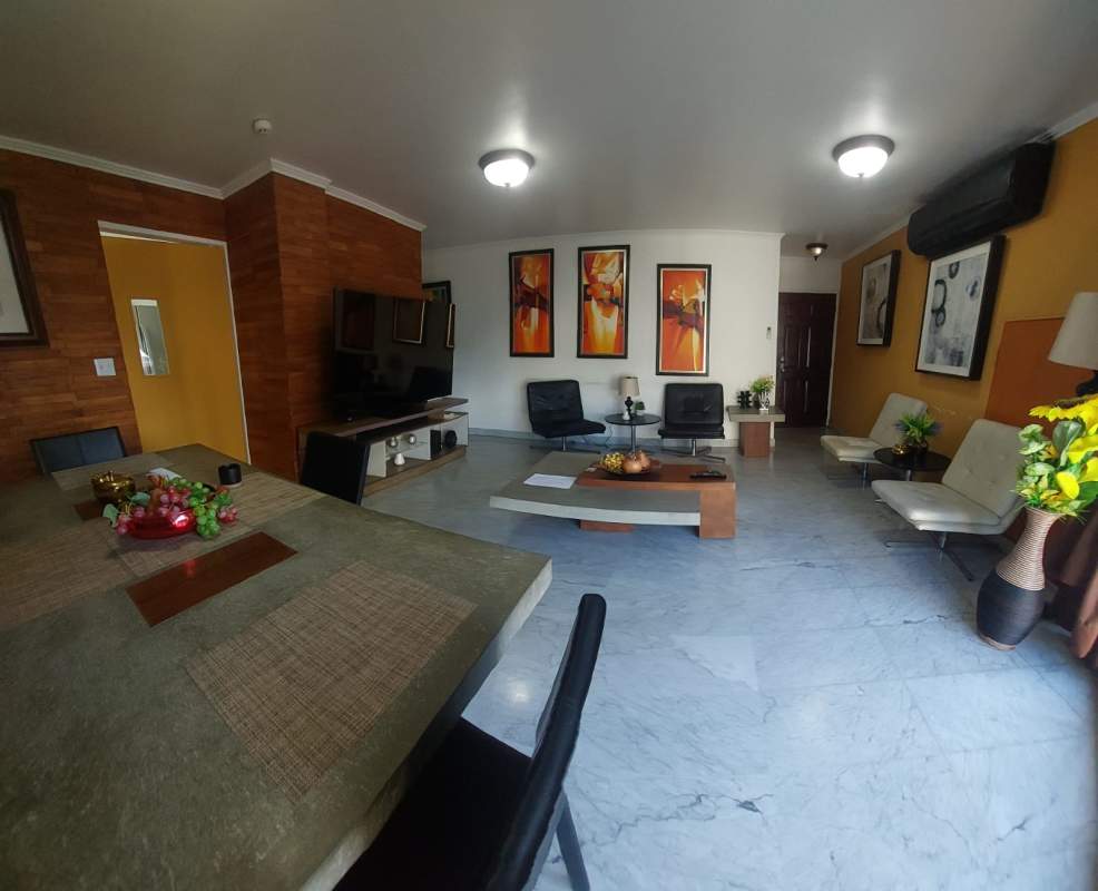 Dining zone in apartment with marble flooring furnishings PH Vista Tower Panama