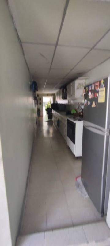 Living and dining area with tile floors and natural light at Cerro Viento
