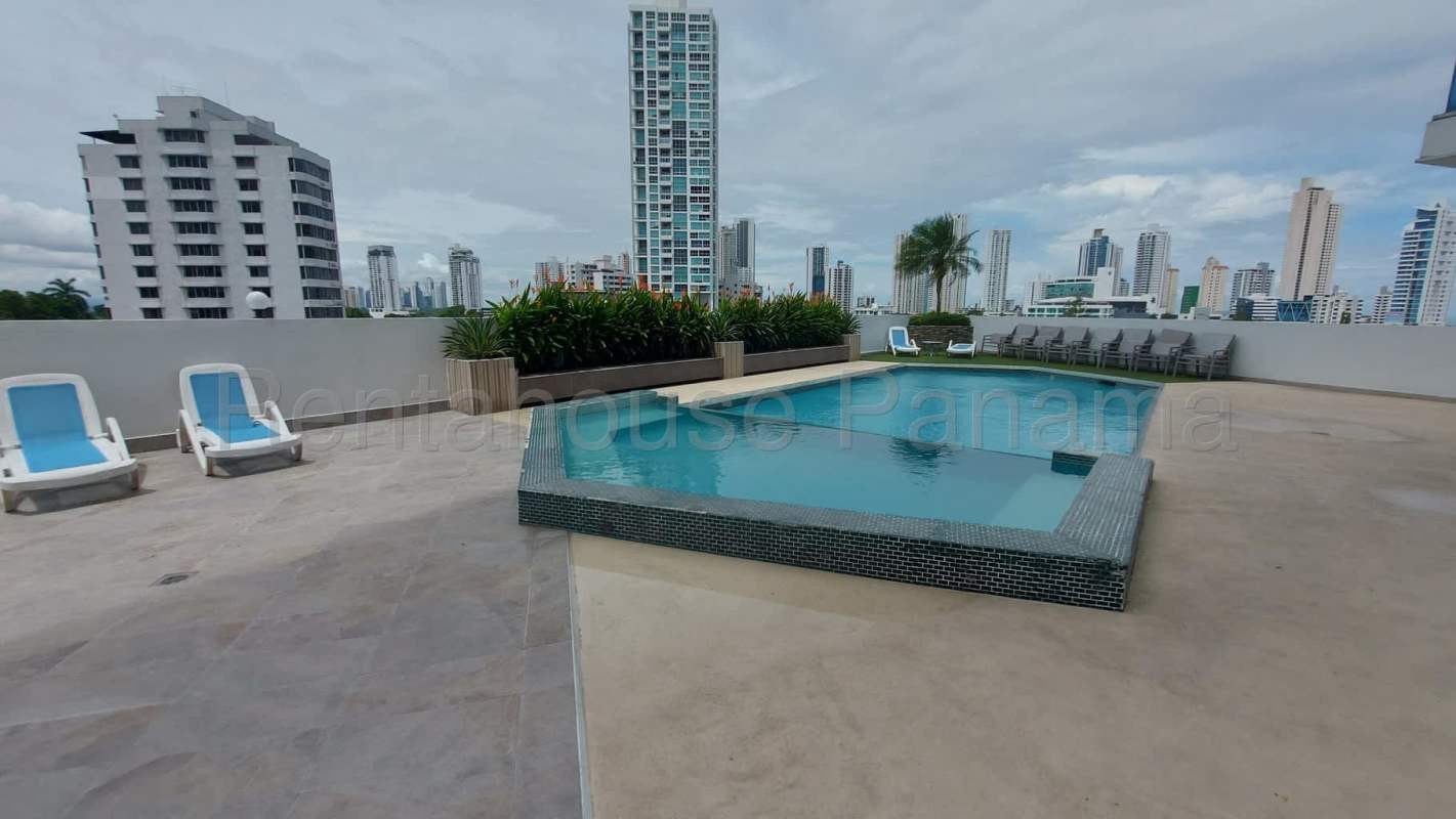 Modern bathroom with glass enclosed shower mirror tile Sky Blue Tower Panama