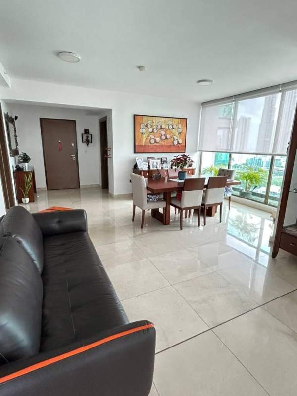 Private balcony with glass railing offering panoramic ocean and city skyline view in PH Park Lane Costa del Este Panama City