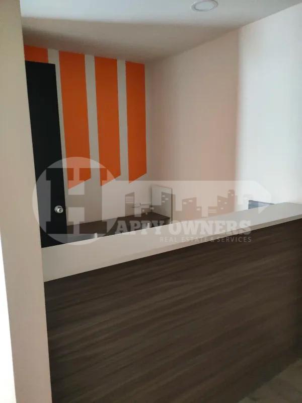 Office space with windows showcasing avenida balboa skyline Torre BAC Panama