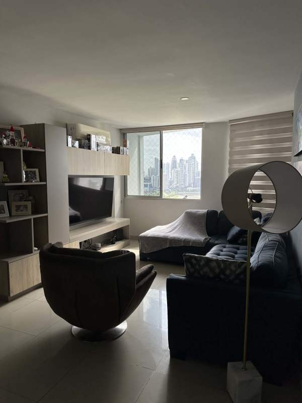 Elegant dining area with modern chandelier in duplex apartment PH Marina Terrace Panama