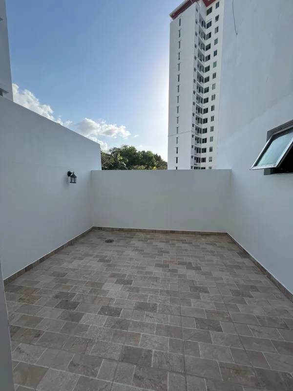 Private covered balcony with garden views at PH Clayton Park Clayton Panama