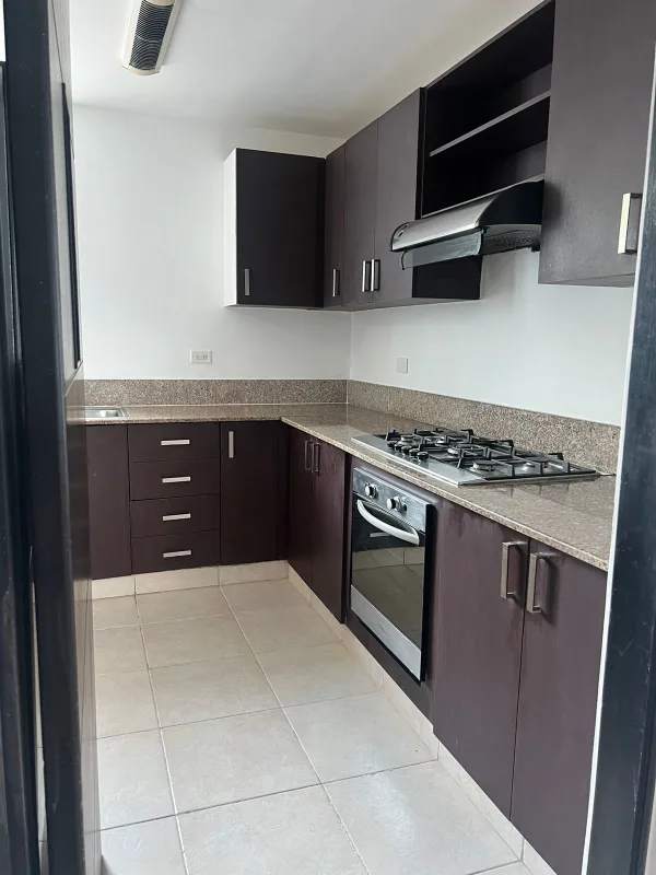 Contemporary kitchen with granite countertops, appliances included at PH Clayton Park Clayton Panama