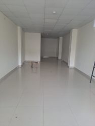 Open retail or office space with tiled floors and plain walls Chitre Center