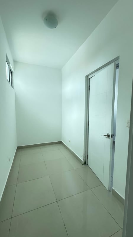 Kitchen with granite counters, cabinetry and terrace view at PH Astoria Panama