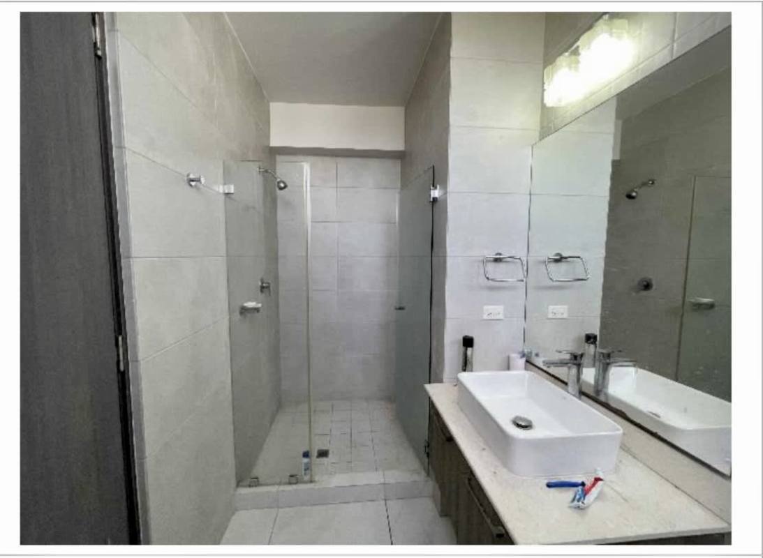 Open living-dining room with city view balcony at PH Los Angeles Parkview Betania Panama