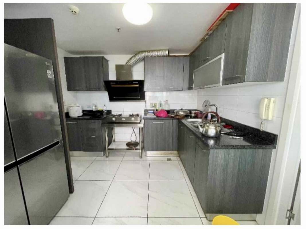 Aerial view of PH Los Angeles Parkview surrounded by Panama City skyscrapers and green areas