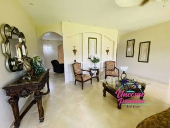 Expansive mature garden with lush trees at beach house near Santa Clara Panama