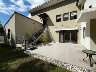 Remodeled luxury kitchen with island at PH Nativa Panama Pacifico smart home