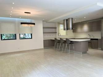 Bright living room open floor plan in smart home PH Nativa Panama