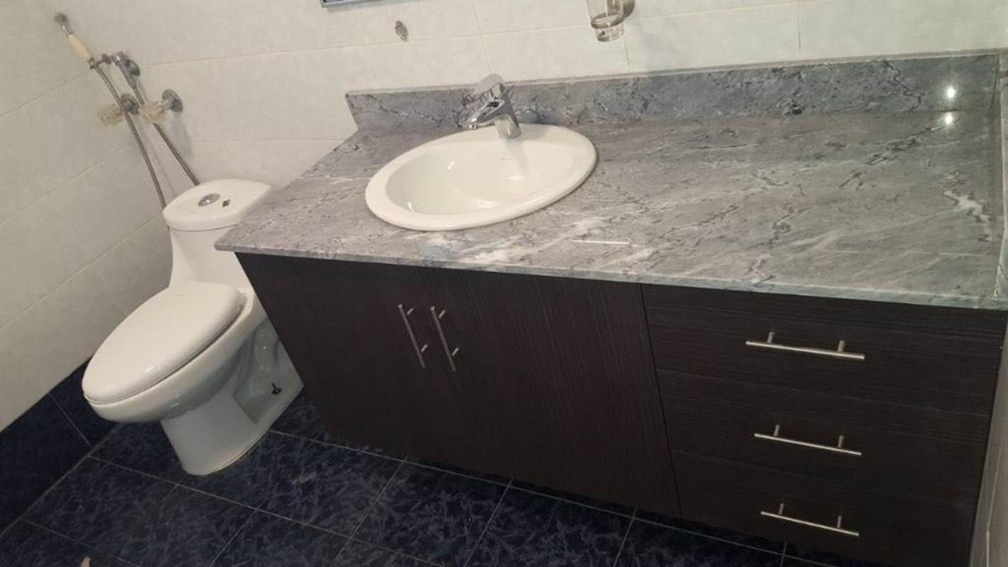 Modern bathroom with porcelain tiles and vanity PH Park 66 apartment Obarrio Panama City