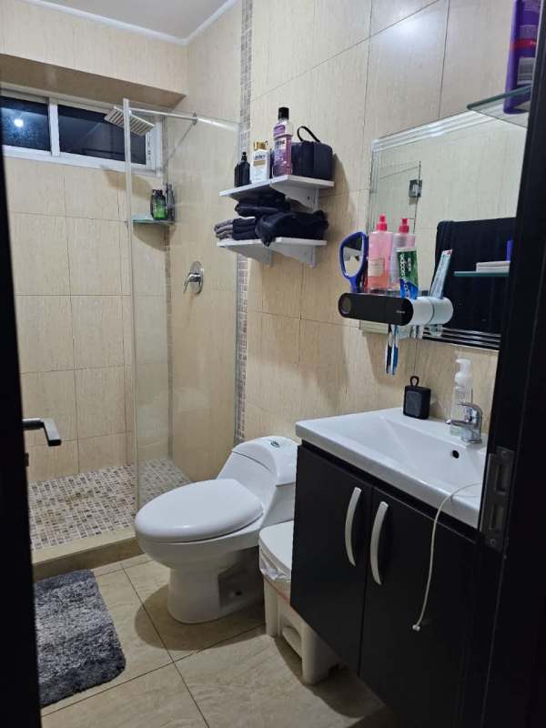 Modern bathroom with glass shower, vanity, contemporary tile in Vista Park Tower Carrasquilla