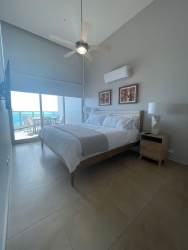 Master bedroom featuring large window and Pacific Ocean views Playa Gorgona