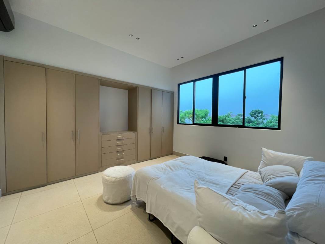 Luxury kitchen with granite counters and LG Signature appliances in Santa María Golf Panama home