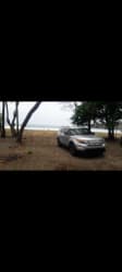 Front parking area with coastal trees and beachfront Playa Venao Panama