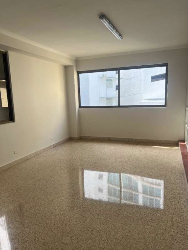 Bright empty living space with polished tile floors and natural light in PH El Cangrejo Panama City