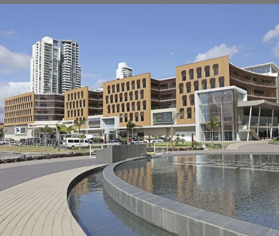 Panoramic view of Town Center Costa del Este complex with fountain and corporate buildings