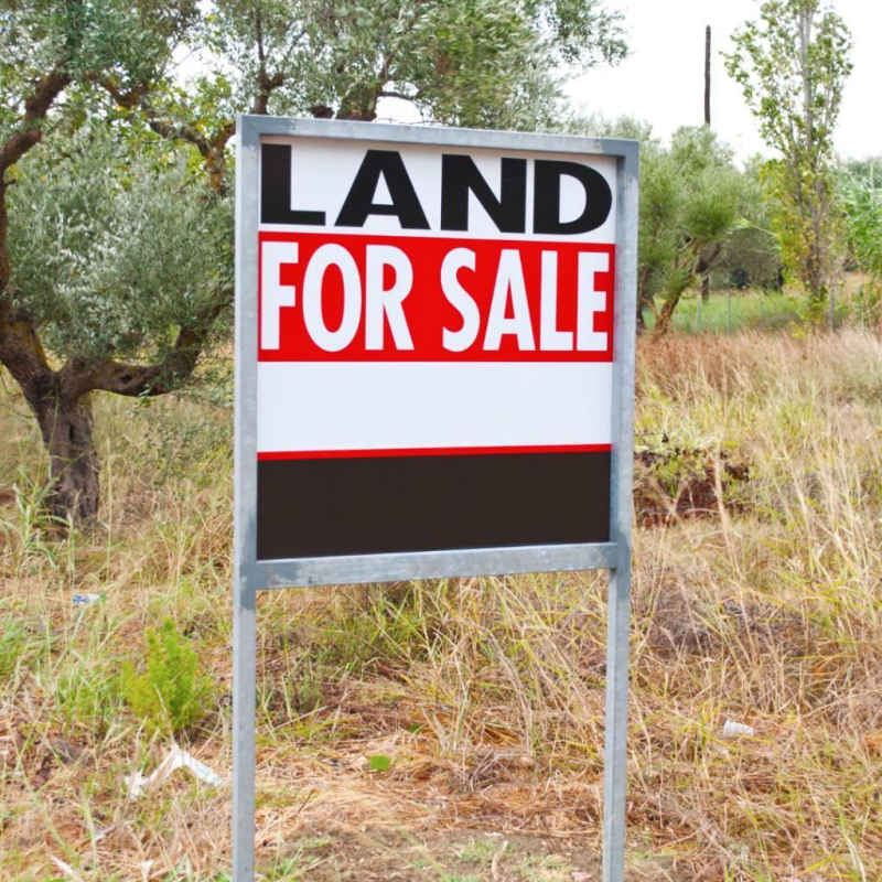 Gated entrance and natural woodland on titled Cerro Azul land Panama