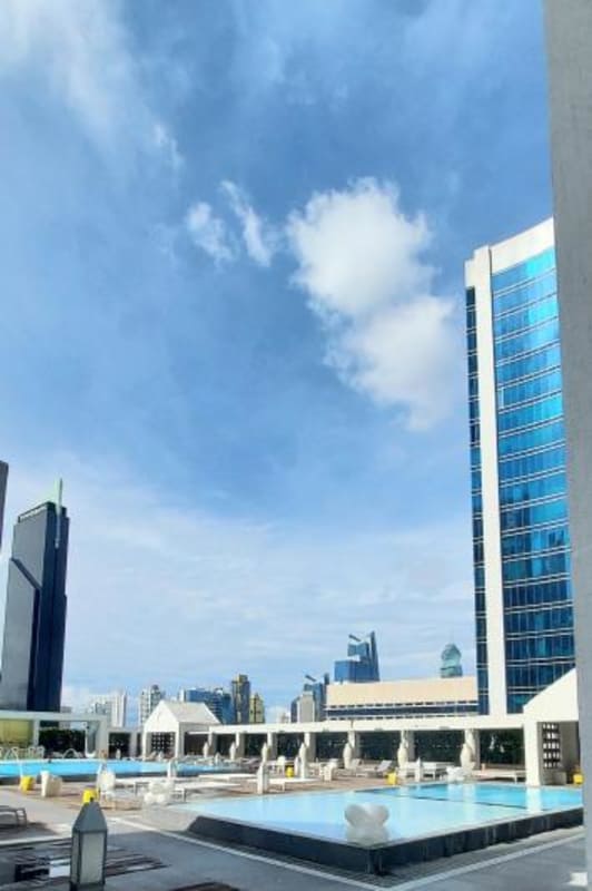 Infinity rooftop pool overlooking Panama Bay and city skyline at PH Yoo Panama