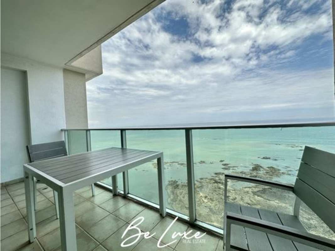 Kitchen with granite countertops and wood cabinets PH Terrasol Panama City ocean view apartment