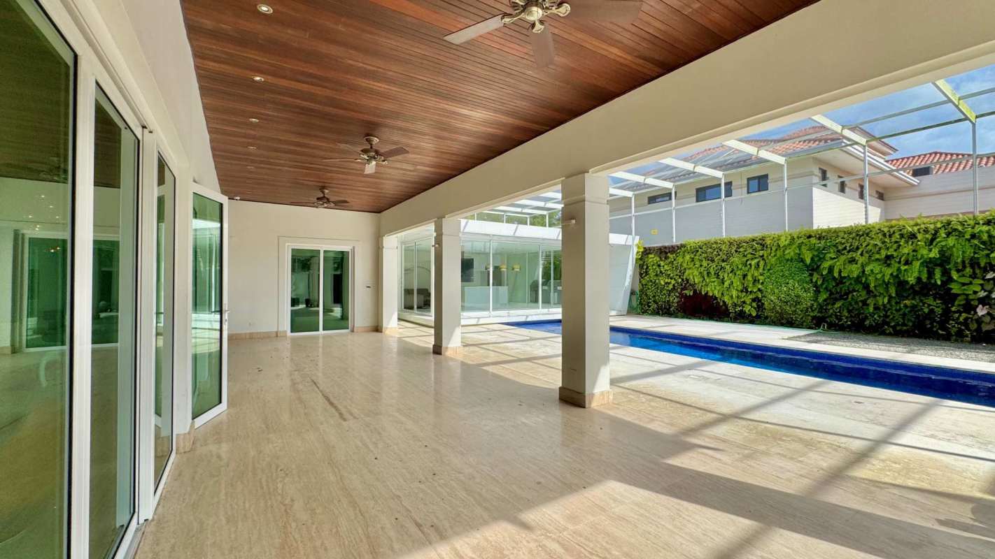 Spacious terrace connected to living room overlooking private pool at Toscana del Este Panama