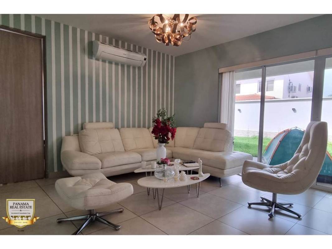 Modern kitchen with granite countertops and stainless appliances in Costa Sur Panama