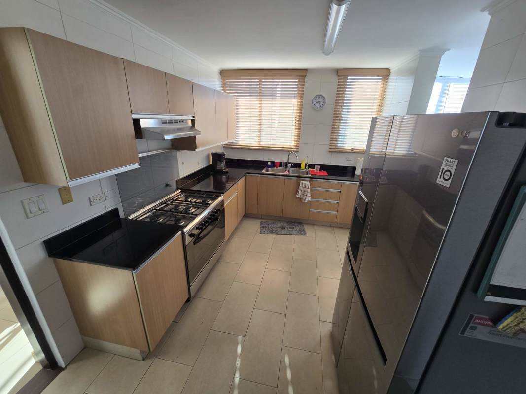 Bright open living dining room with balcony access, city views PH Pacific Coast San Francisco Panama