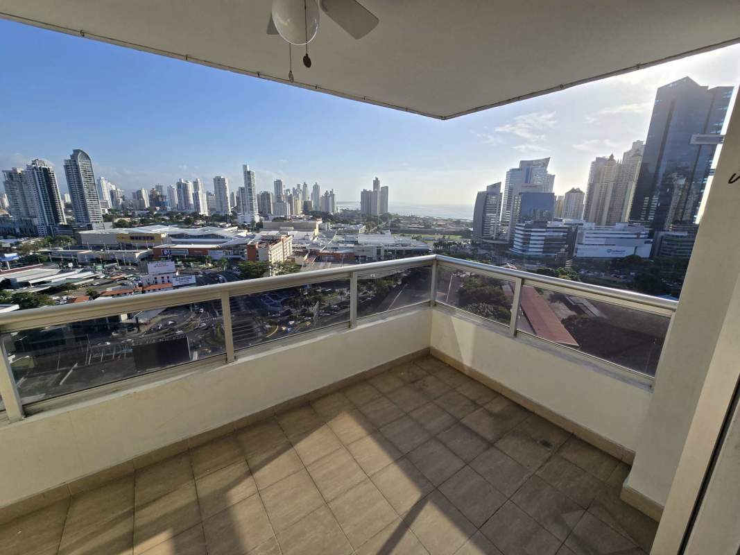 Spacious modern kitchen with granite counters, wood cabinets, stainless appliances PH Pacific Coast Panama