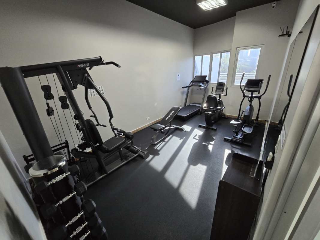 Fitness center with cardio machines and weights PH Pacific Coast San Francisco Panama
