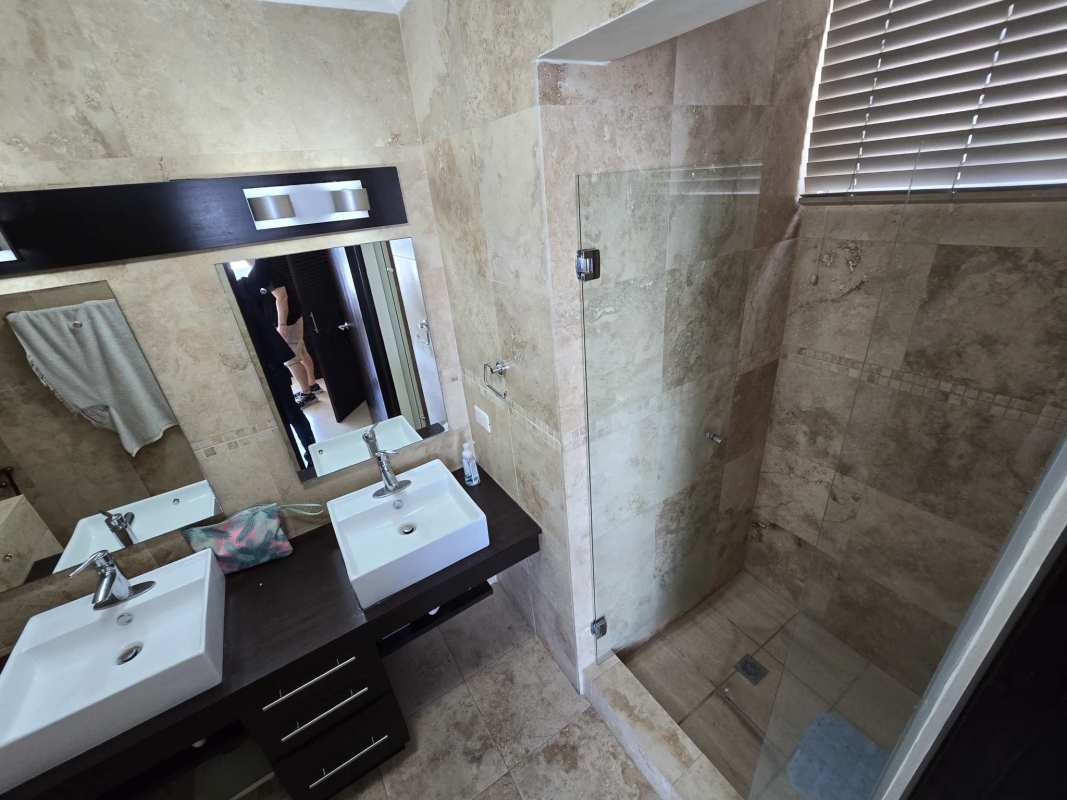 Laundry space with washer dryer, utility sink, window light PH Pacific Coast Panama