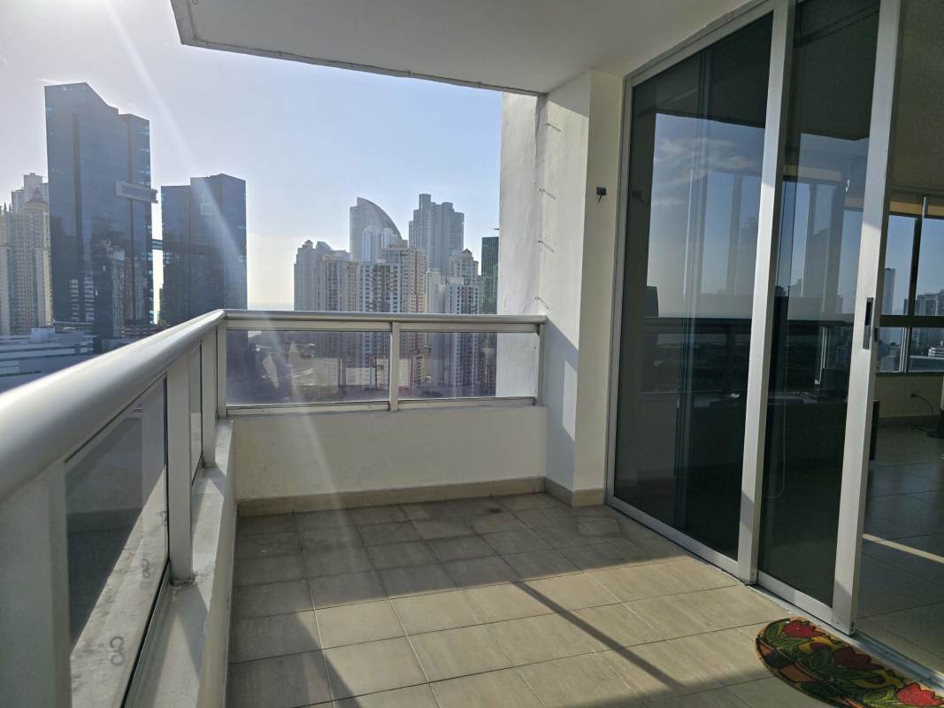 Balcony with panoramic skyline city view of pool in PH Pacific Coast Panama City