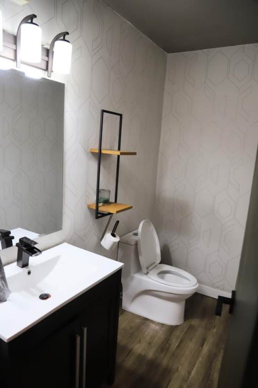 Elegant modern bathroom with mirror, vanity, tile finishes PH Country Park Panama