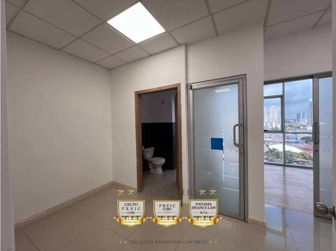 Hallway with tiled floor, drop ceiling and glass doors in PH Brazil 405 commercial office Panama