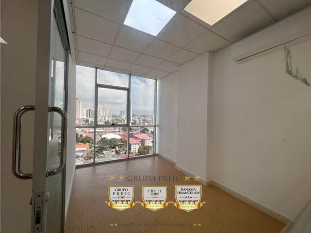 Glass separated interior private office overlooking Panama skyline in PH Brazil 405 on Via Brasil